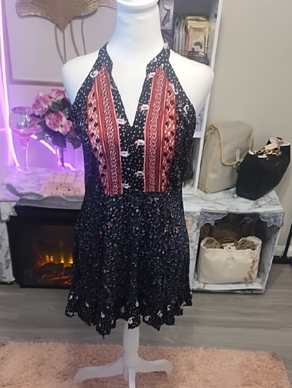 miami black dress with white polka dots and pink floral accents